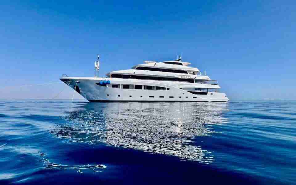 The Sea Fox liveaboard on the surface over the reefs